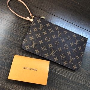 Authentic never used Louis Vuitton Wristlet
